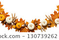 Hanging Garland of many maple leaves, white and yellow pumpkins, acorns, ears of wheat on a white plain background. Decoration for Halloween or Thanksgiving. 130739262