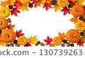 Hanging Garland of many maple leaves, white and yellow pumpkins, acorns, ears of wheat on a white plain background. Decoration for Halloween or Thanksgiving. 130739263