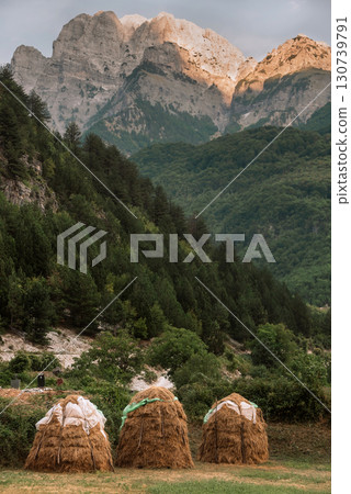 Pastoral Landscape with Haystacks in Theth Village 130739791