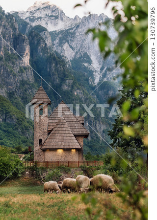Mountain Scenery with Sheep Gazing in Theth Mountain Scenery with Sheep Gazing in Theth 130739796