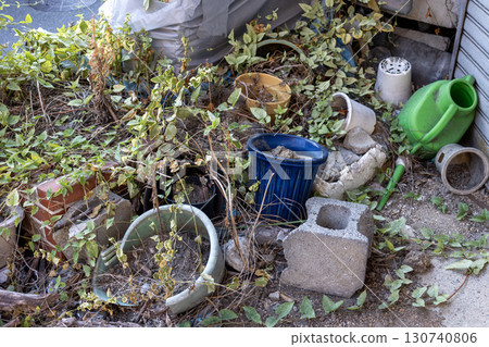 Abandoned flower beds and broken flower pots 130740806