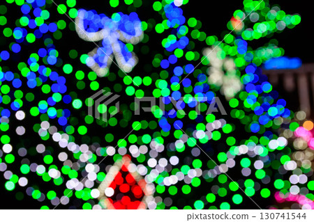 Festive multicolored blurred abstract background. Christmas lights bokeh background 130741544