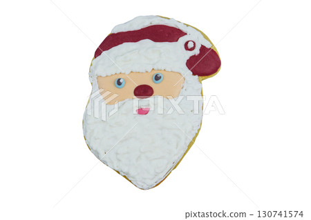 Christmas gingerbread cookie made in shape of Santa Claus isolated on white background Christmas gingerbread cookie made in shape of Santa Claus isolated on white background 130741574