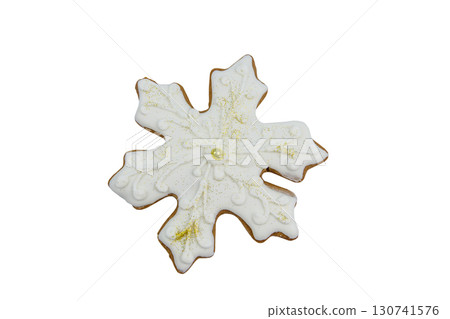 Christmas gingerbread cookie made in shape of snowflake isolated on white background 130741576