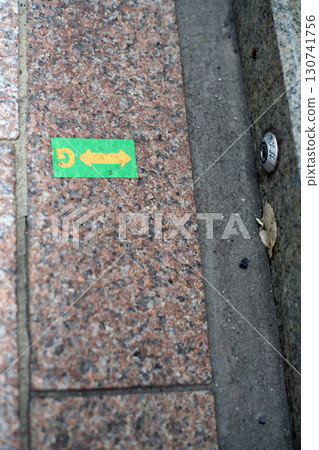 Gas pipe marker on the sidewalk Gas pipe marker on the sidewalk 130741756