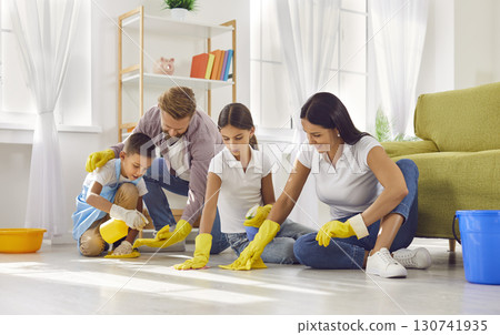 Happy Family Bonding in Household Cleanup 130741935