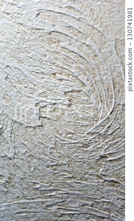 Textured abstract wall surface with swirling patterns Textured abstract wall surface with swirling patterns 130741981