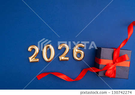 2026 Celebration with Gift Box and Golden Balloons 130742274