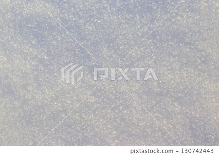 Texture of the white snow. Winter background 130742443