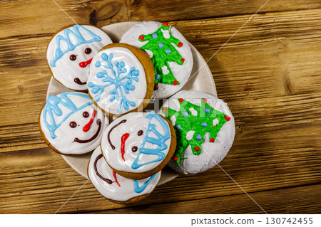 Christmas gingerbread cookies on a wooden background. Top view 130742455