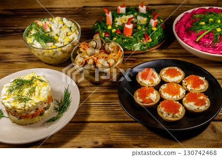 Christmas dinner set of food on a wooden table Christmas dinner set of food on a wooden table 130742468