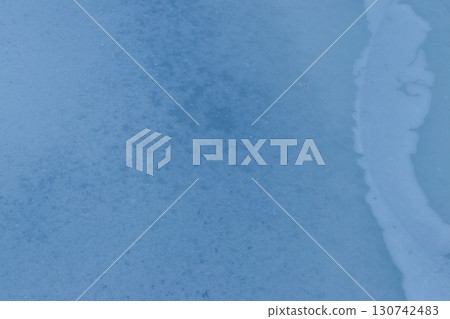 Texture of the ice surface. Winter background 130742483