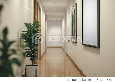 Modern hotel corridor with wooden floor, white walls, empty frames and ficus plant, perfect for showcasing artwork or photography 130742550