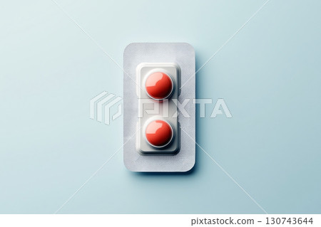 Vibrant image of red pills on blue background, perfect for medical concepts 130743644
