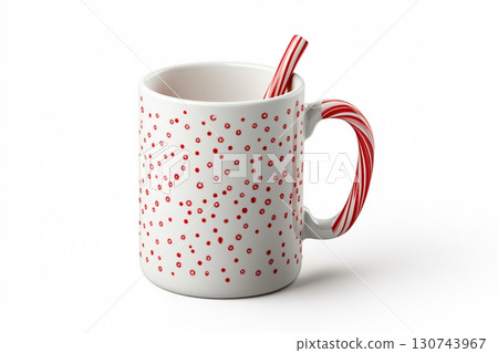 Christmas mug with red and white candy cane handle standing on white background 130743967