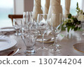 elegant banquet tables prepared for a conference or a party indoors 130744204