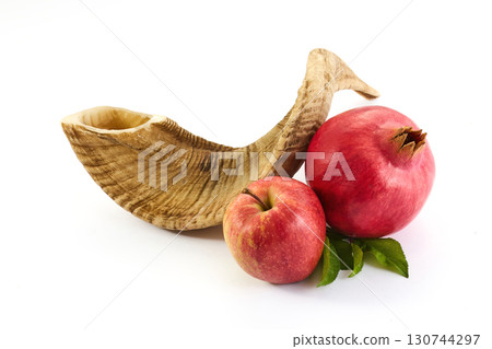 Rosh Hashanah Symbols. A shofar, apple, and pomegranate symbolize Rosh Hashanah 130744297