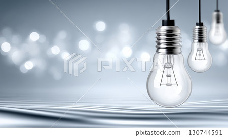 Ethereal hanging light bulbs create calming ambiance over soft waves 130744591