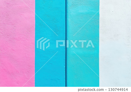 Colorful wall featuring pink and shades of blue in a vibrant urban setting Colorful wall featuring pink and shades of blue in a vibrant urban setting 130744914