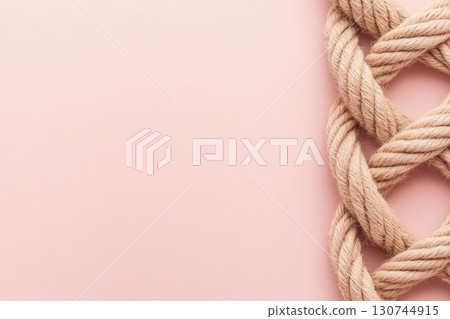 Twisted rope texture on soft pink for your creative projects 130744915