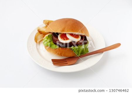 Teriyaki burger on a plate isolated on white background Teriyaki burger on a plate isolated on white background 130746462