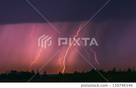 Lightning storm in the sky, lightning bolts in the storm clouds Lightning storm in the sky, lightning bolts in the storm clouds 130746546