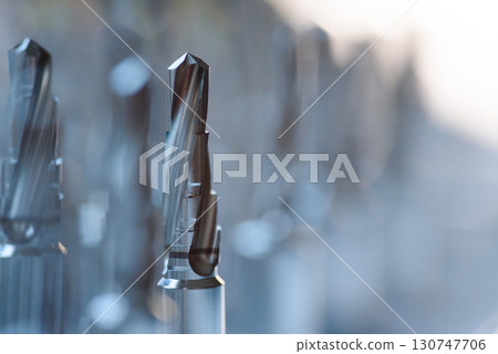 Macro photo of dental implant drill bits in surgical tray, close-up professional dentistry equipment 130747706