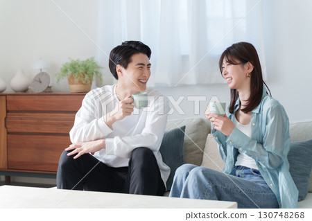 Smiling couple in a room 130748268
