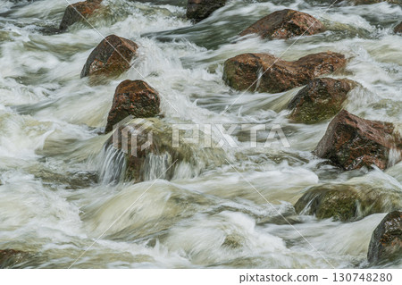 The Amano River turns muddy after the rain in Hirakata City, Osaka Prefecture 130748280