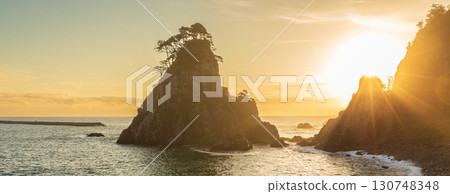 "Iwate Prefecture" Kosode Coast Tsurigane Cave, Kuji City, shining golden in the morning sun 130748348