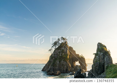 "Iwate Prefecture" Kosode Coast Tsurigane Cave, Kuji City, shining golden in the morning sun 130748355
