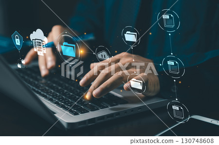 DMS Document Management System concept. Data storage. Businessman using a tablet and touching folder icon to search on databases with virtual screen. documents digital for corporate businesses. 130748608