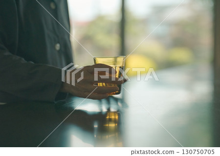 Elderly people wake up with a glass of water Elderly people wake up with a glass of water 130750705