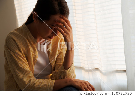 Depressed young asian woman with mental health problem in mind need crucial treatment from overthinking fatigue girl, disruptive thought, dissocial, anxiety and mental health disorders. 130751750