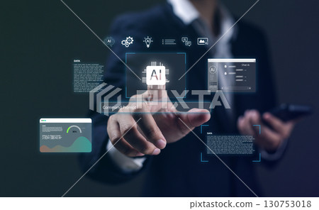 Businessman using artificial intelligence technology interface with AI icons, data analytics, and digital innovation concept for machine learning, automation and future technology solutions. Businessman using artificial intelligence technology interface with AI icons, data analytics, and digital innovation concept for machine learning, automation and future technology solutions. 130753018