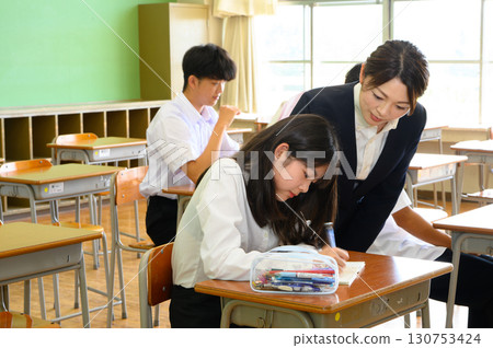 Students and teachers taking lessons in the classroom Learning, education, school life 130753424