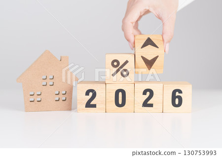 2026 New Year with percentage change to UP and Down arrow with Home model. Real estate Mortgage, Refinance, House loan and debt, Interest rate, Insurance, Financial and Property Tax 130753993