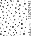 black and white polka dot pattern with irregularly shaped circles and ovals 130754762
