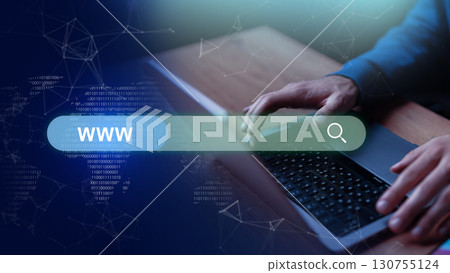 Hands typing on laptop keyboard while searching the web with digital graphics in a modern workspace Hands typing on laptop keyboard while searching the web with digital graphics in a modern workspace 130755124