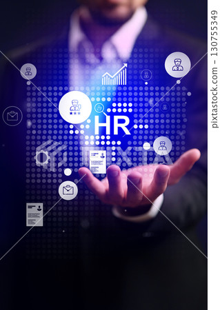 Human resources concepts illustrated with digital icons in a business setting showcasing technology and innovation in workplace management 130755349