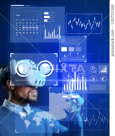 User engaging with virtual reality technology to analyze data and financial trends in a futuristic setting 130755366