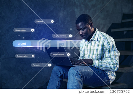 Young man engages with advanced technology to generate content at an urban location during evening hours 130755762