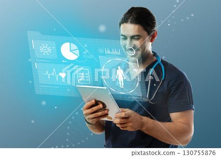 Healthcare professional uses tablet to access digital health information in modern medical setting 130755876
