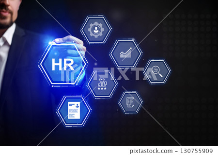 Human resources management concepts displayed through digital icons with a professional in a suit in a modern setting 130755909
