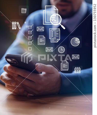 Focus on productivity with digital tools and smartphone in workspace during morning hours 130755952