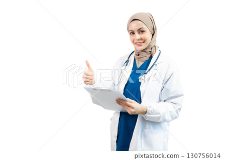 Muslim Arab person. The face of a female doctor on an isolated white background. Muslim Arab person. The face of a female doctor on an isolated white background. 130756014