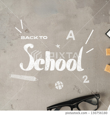 Bright back-to-school announcement with a playful design featuring stationery elements on a textured surface Bright back-to-school announcement with a playful design featuring stationery elements on a textured surface 130756180