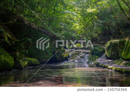 Cobblestones along the valley Cobblestones along the valley 130756368