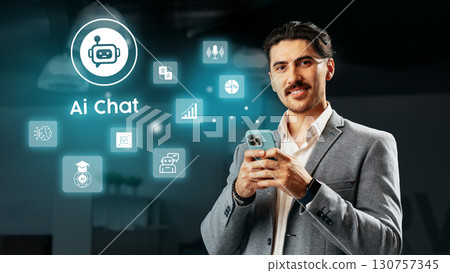 Professional man engages with AI chatbot in a modern office environment during the day Professional man engages with AI chatbot in a modern office environment during the day 130757345