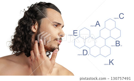 Young man exploring vitamin benefits for skincare in a bright, modern environment during daylight Young man exploring vitamin benefits for skincare in a bright, modern environment during daylight 130757491